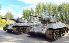 Battle tank brothers T-34 who sunbathe at The Parola Armour Museum